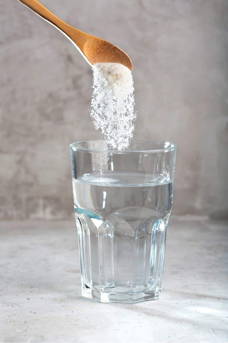 Vitalyte powder into a glass of water